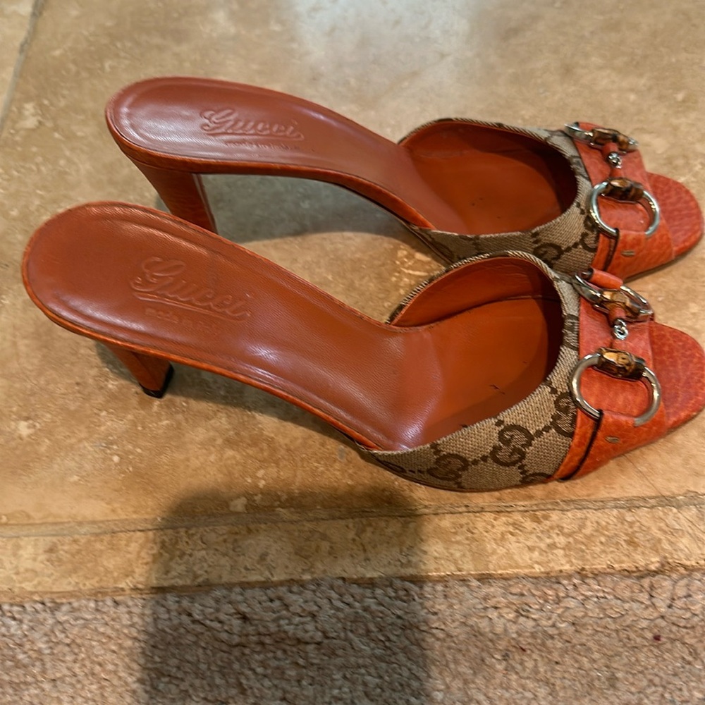 Gucci slip on sandals in burnt orange. Size 371/2. Heels 21/2”. Looks like new